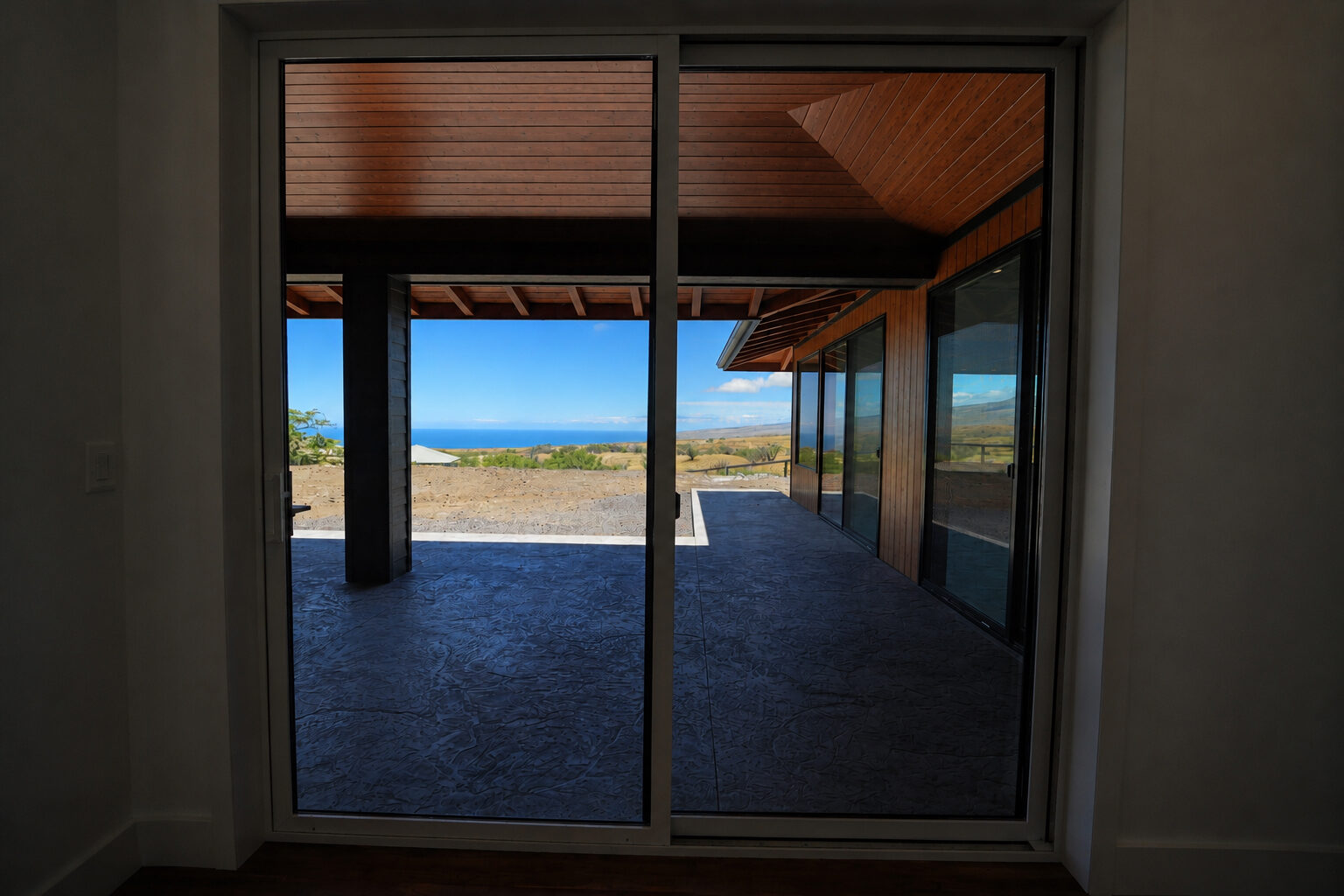 Bedroom opening to the ocean view